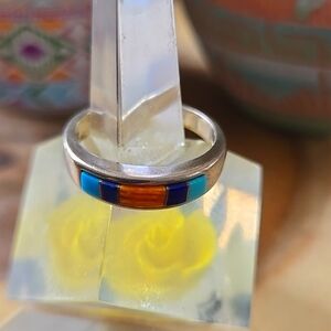 Sterling silver ring with Turquoise and shell inlay.